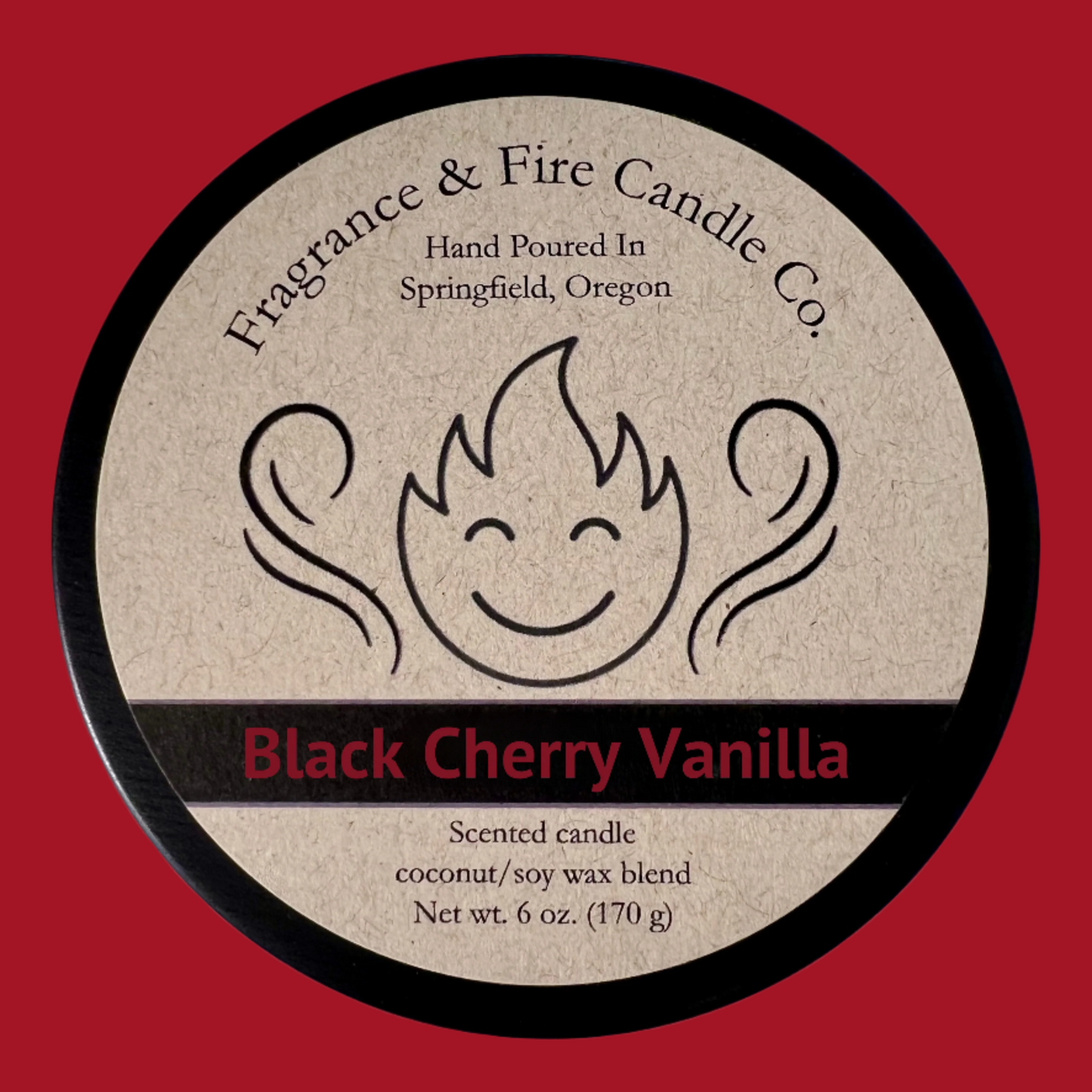 Round candle top with brown label against dark red background that shows the candles name as "Black Cherry Vanilla".