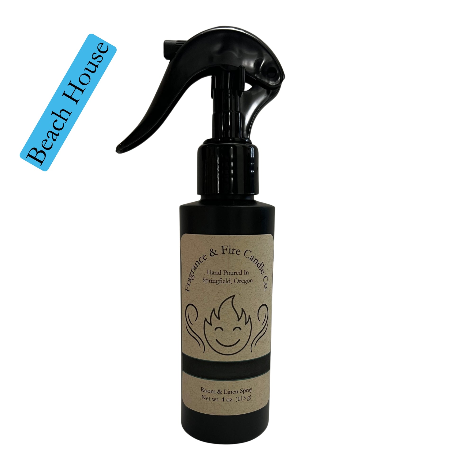 Fragrance & Fire Beach House room & linen spray. Sleek black bottle with brown label showing company logo.