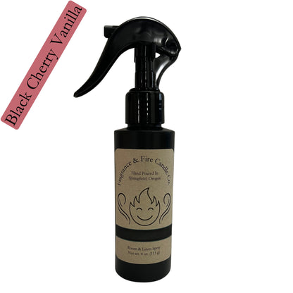 Fragrance & Fire Black Cherry Vanilla room & linen spray. Sleek black bottle with brown label showing company logo.