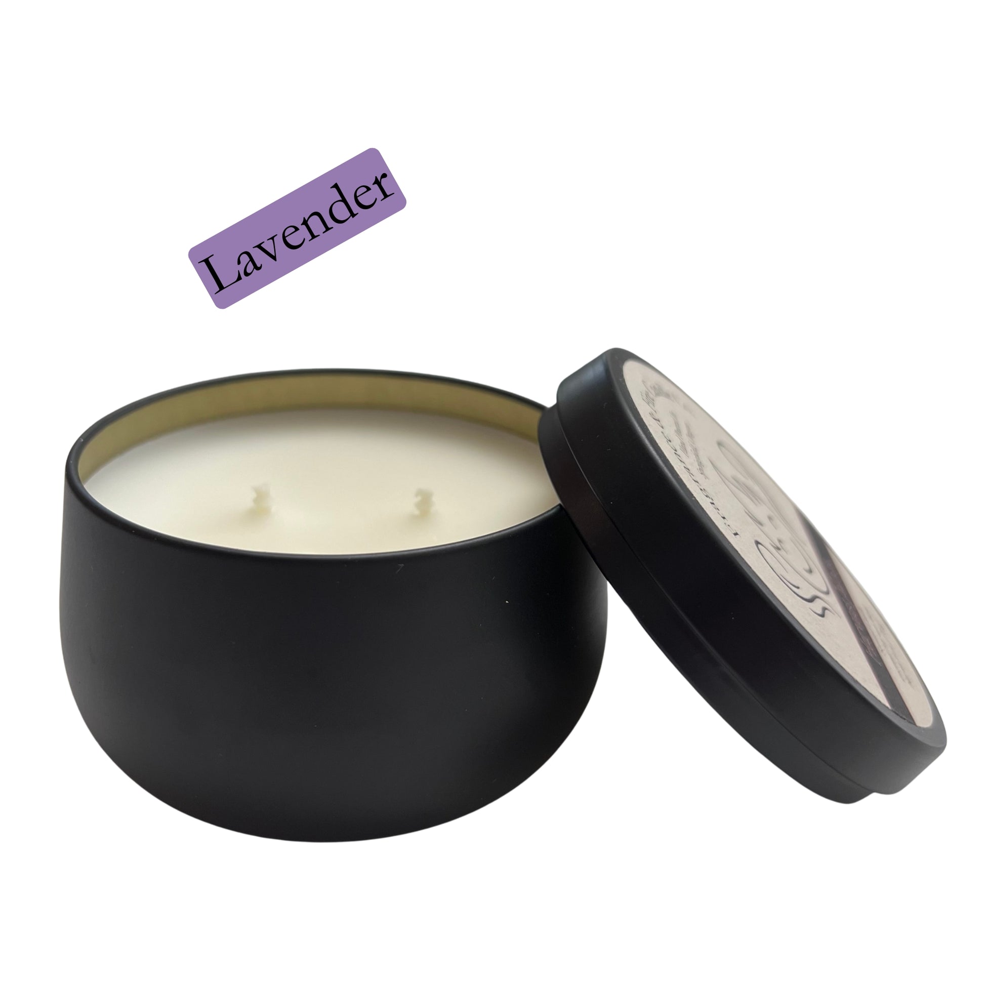 Fragrance & Fire Lavender candle. Black container with lid leaning on the side partially showing label with company logo. 2 wicks showing and gold lining of inside the container.