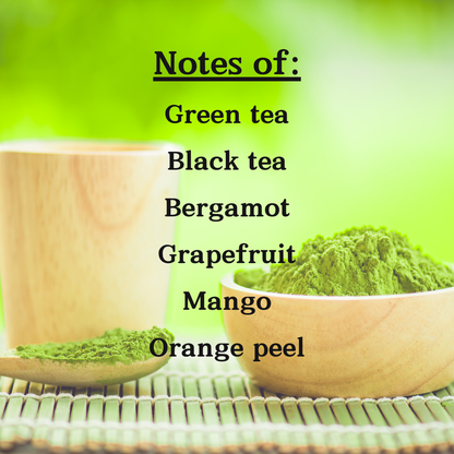 Fragrance & Fire Sweet Grapefruit Matcha candle scent notes overlaid on an image of ground green tea against a yellow background. Listed notes include: green tea, black tea, bergamot, grapefruit, mango, and orange peel.